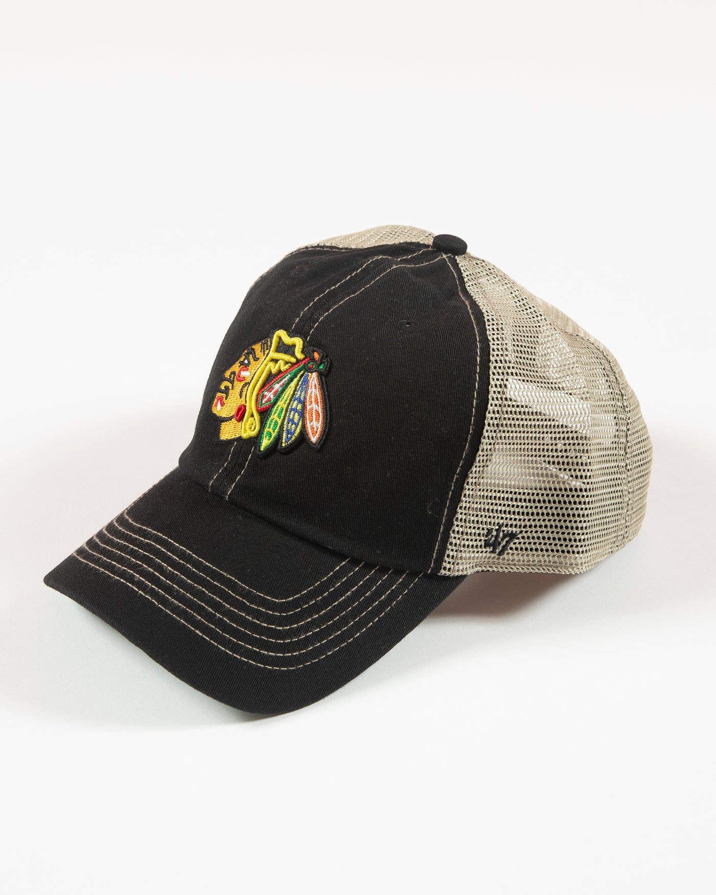'47 adjustable clean up cap with Chicago Blackhawks primary logo embroidered on front in an all over black and tan colorway - left angle lay flat