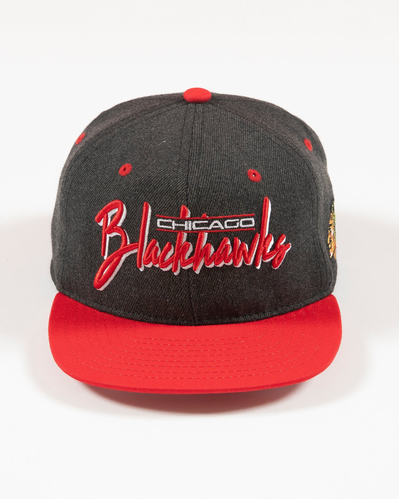 Outerstuff faded black and red Chicago Blackhawks wordmark youth cap - front lay flat