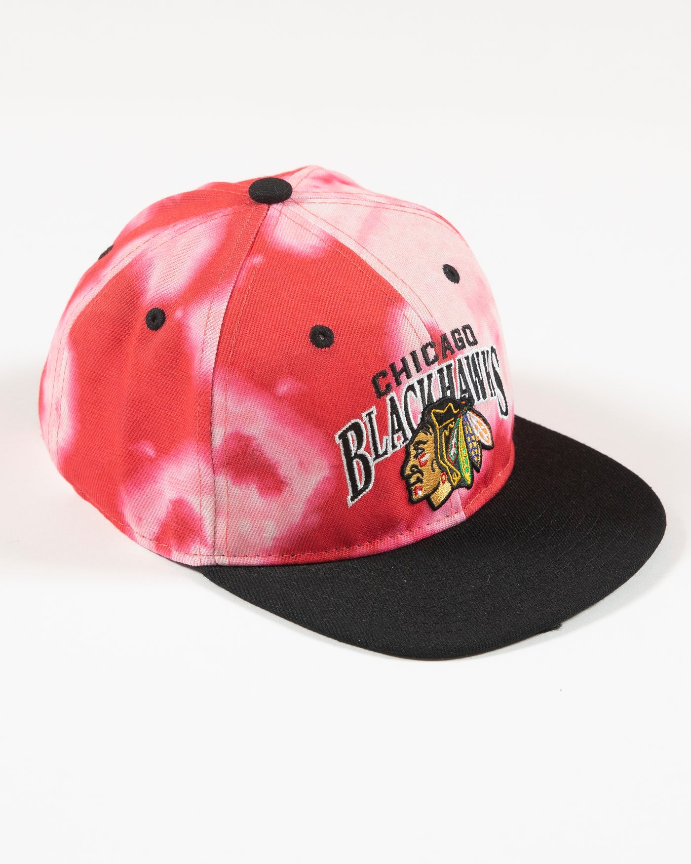 Outerstuff red bleached youth snapback with Chicago Blackhawks wordmark and primary logo embroidered on front - right angle lay flat