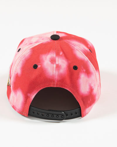Outerstuff red bleached youth snapback with Chicago Blackhawks wordmark and primary logo embroidered on front - back lay flat