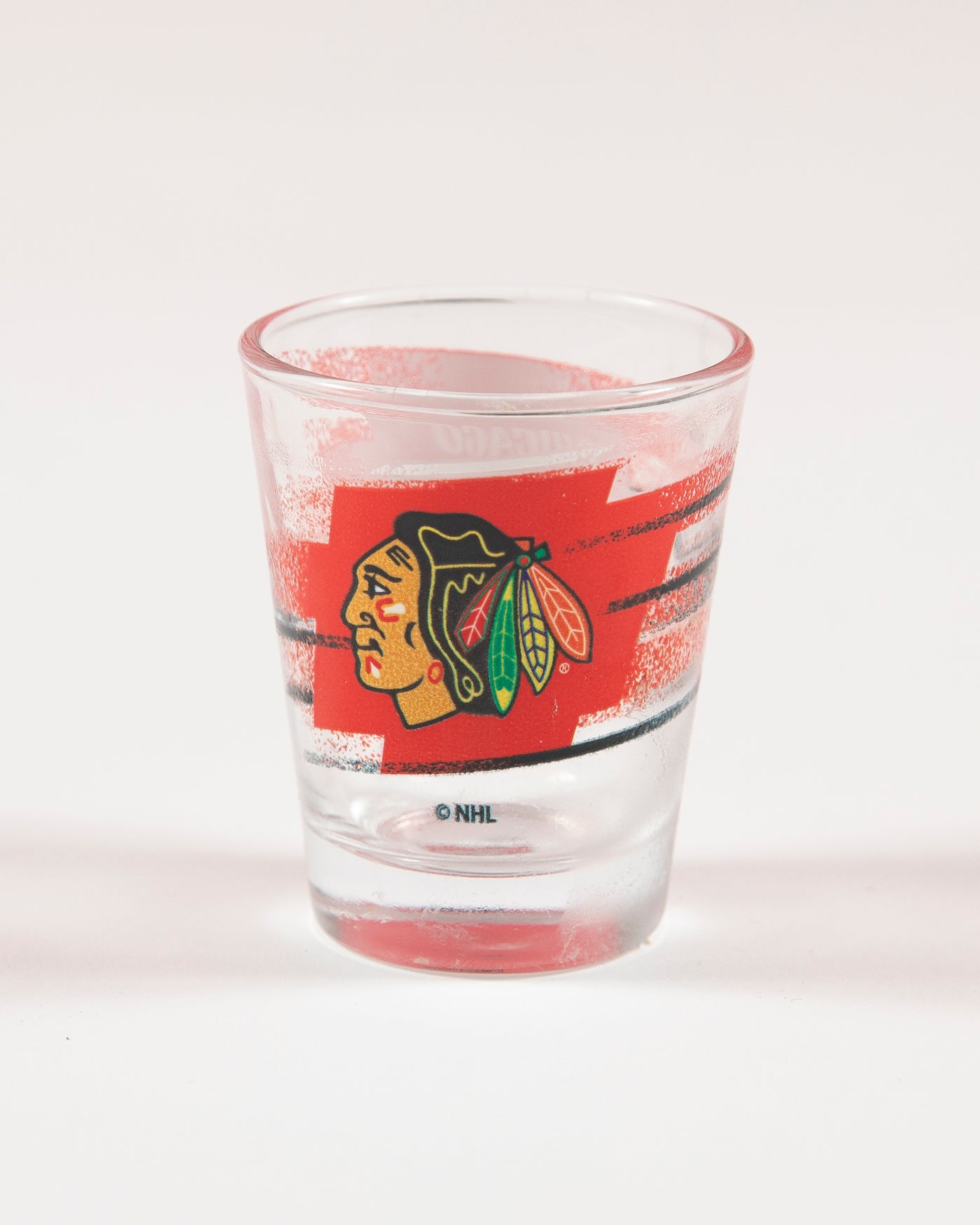 Chicago Blackhawks branded shot glass with primary logo - front angle