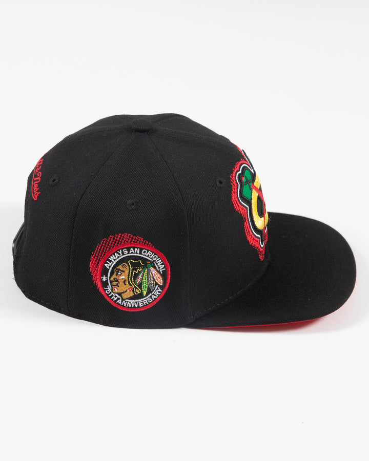 black Mitchell & Ness snapback with Chicago Blackhawks secondary logo embroidered on front and primary logo patch embroidered on right side - right side lay flat 