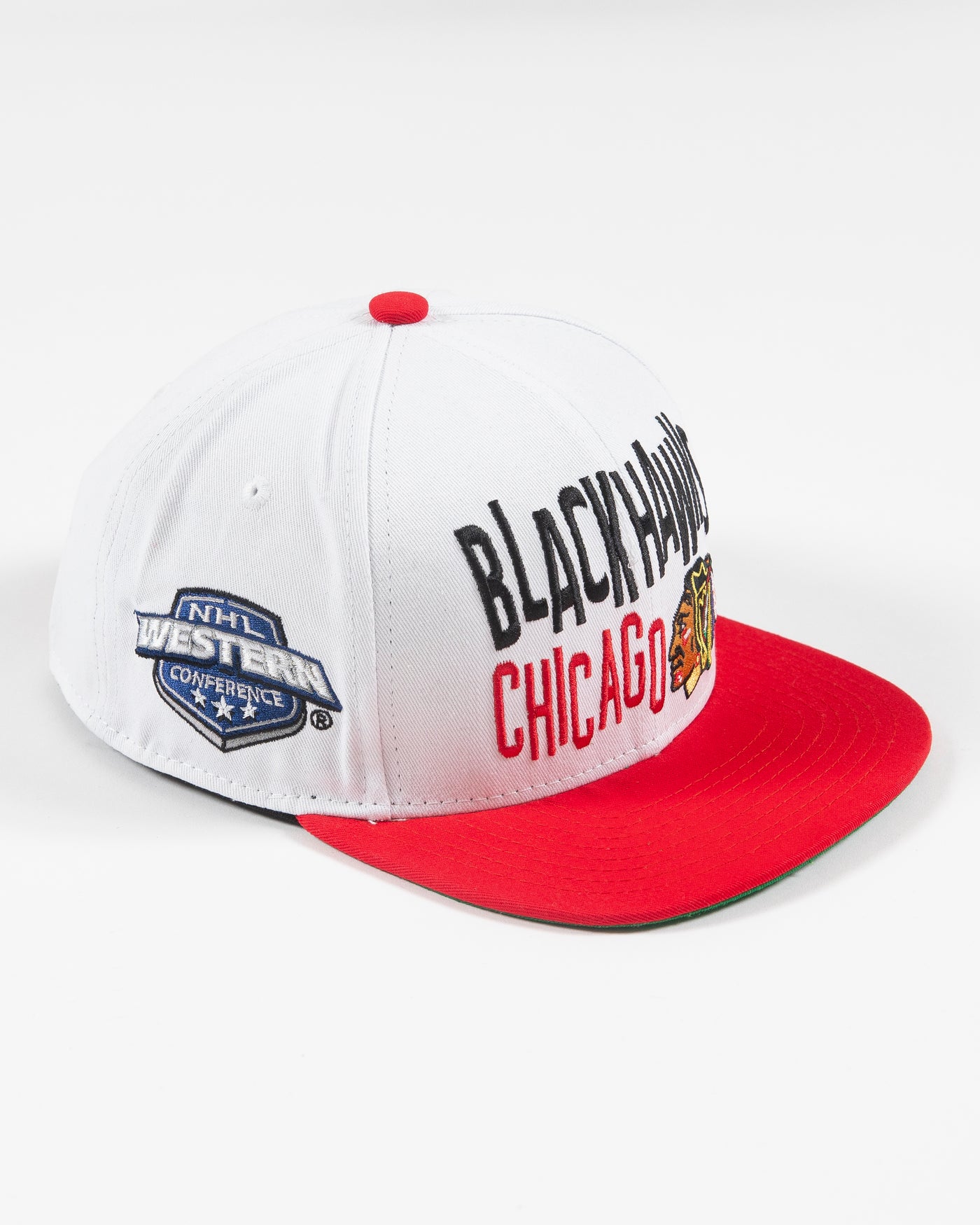 white and red Mitchell & Ness youth snapback with Chicago Blackhawks wordmark and primary logo embroidered on front - right angle lay flat