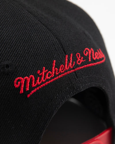 black and red Mitchell & Ness youth snapback with Chicago Blackhawks primary logo embroidered on front - detail 
