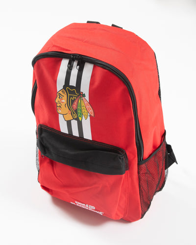 red Chicago Blackhawks zip backpack with front pock - angle lay flat