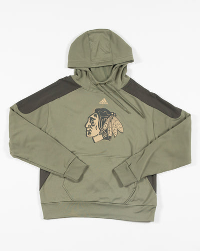 green adidas military salute hoodie with Chicago Blackhawks primary logo across chest - front lay flat