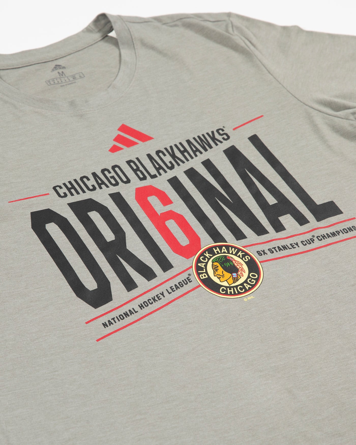 grey adidas t-shirt with vintage Chicago Blackhawks primary logo and Original 6 graphic across chest - detail lay flat