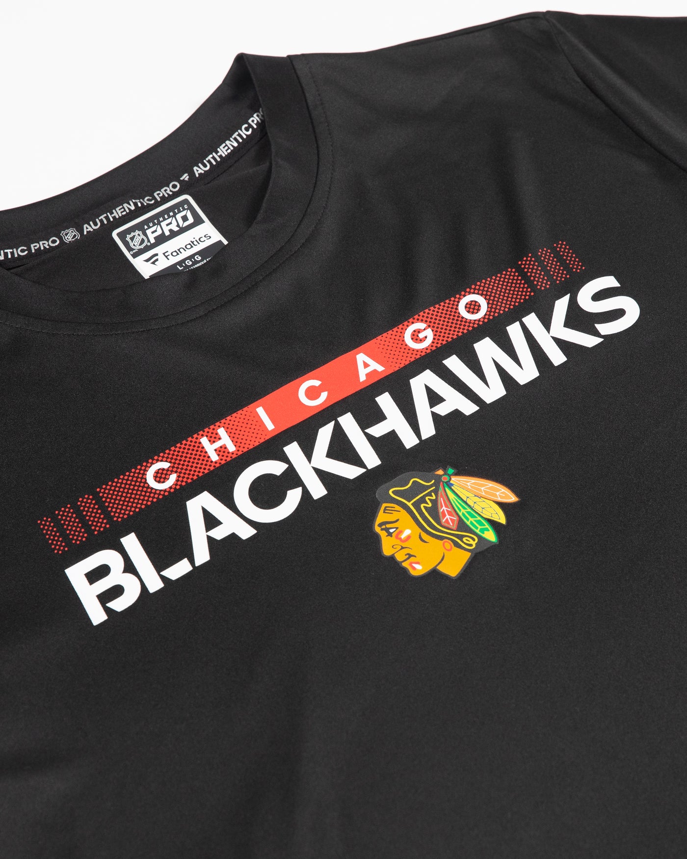 Fanatics Authentic Pro black t-shirt with Chicago Blackhawks wordmark and primary logo graphic across chest - detail llay flat