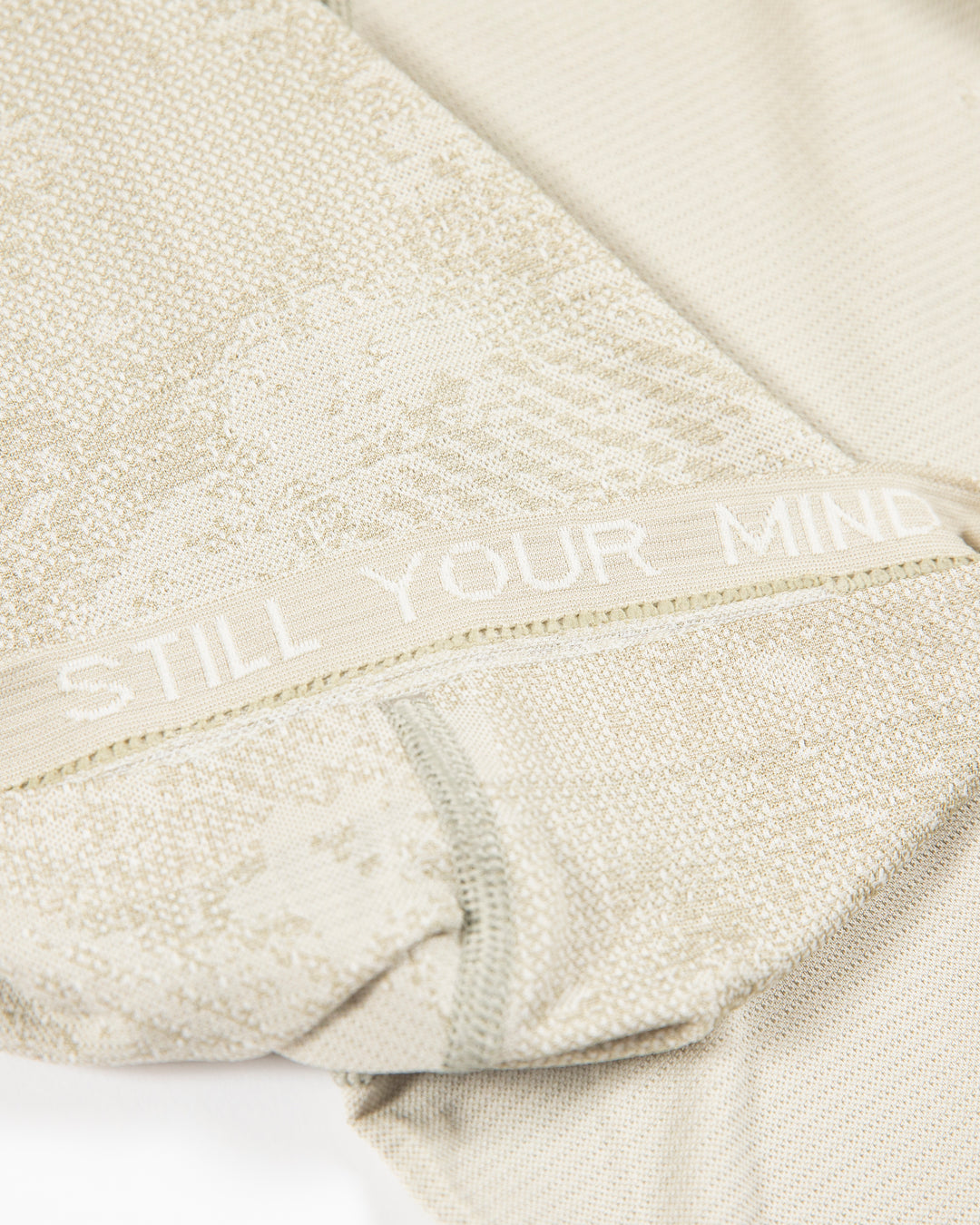 off white lululemon short sleeve t-shirt with Chicago Blackhawks secondary logo on left shoulder - detail lay flat