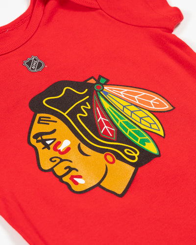 Red Outerstuff Chicago Blackhawks onesie with Bedard 98 on back and primary logo across front - detail lay flat