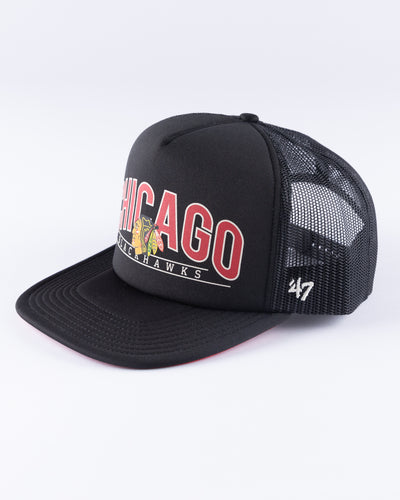 black '47 brand trucker with Chicago Blackhawks wordmark and primary logo across front panel - left angle lay flat