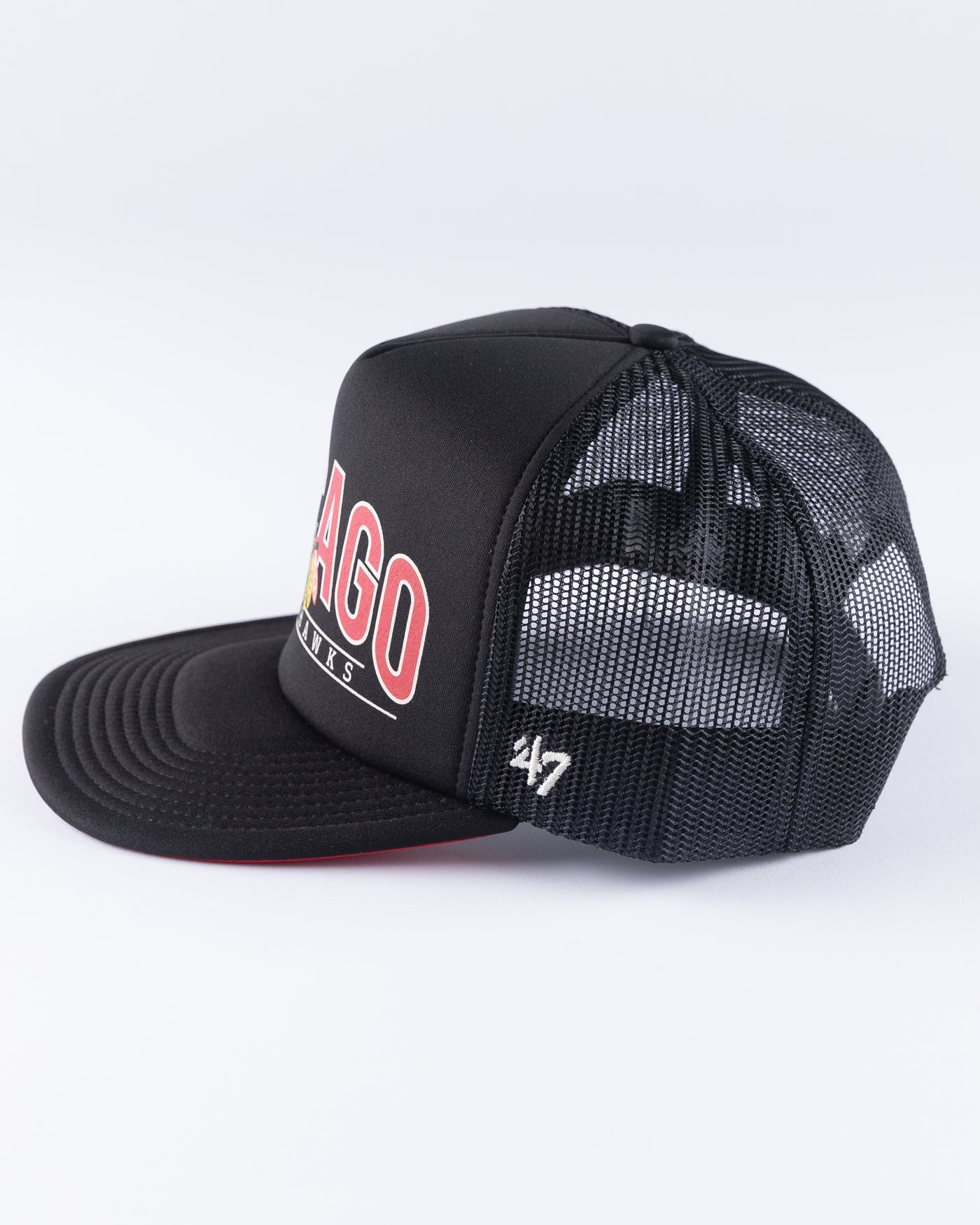 black '47 brand trucker with Chicago Blackhawks wordmark and primary logo across front panel - left side lay flat