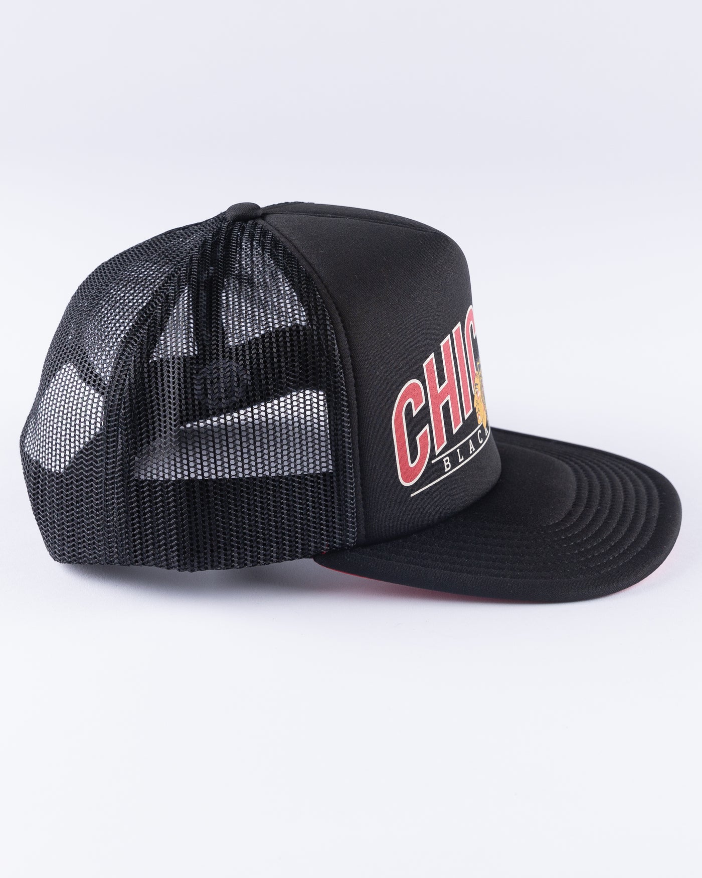 black '47 brand trucker with Chicago Blackhawks wordmark and primary logo across front panel - right side lay flat