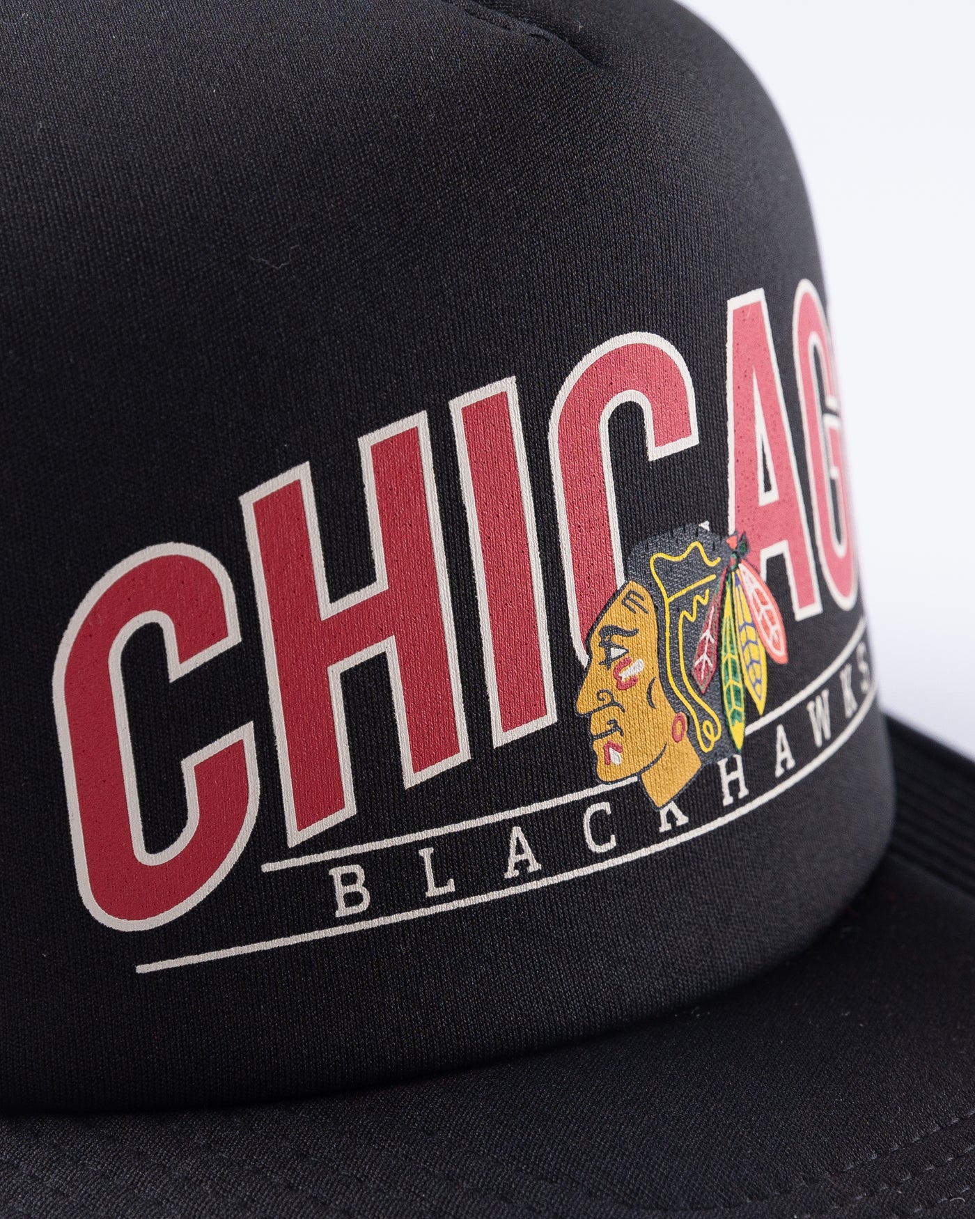 black '47 brand trucker with Chicago Blackhawks wordmark and primary logo across front panel - detail lay flat