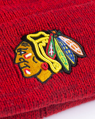 red '47 brand knit beanie with Chicago Blackhawks primary logo embroidered on front - detail lay flat