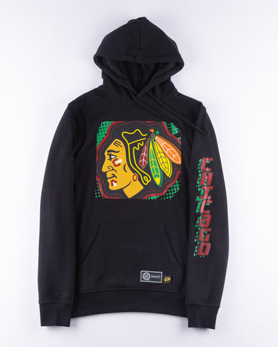 black Mitchell & Ness hoodie with Chicago Blackhawks primary logo across front and Chicago wordmark on left arm - front lay flat