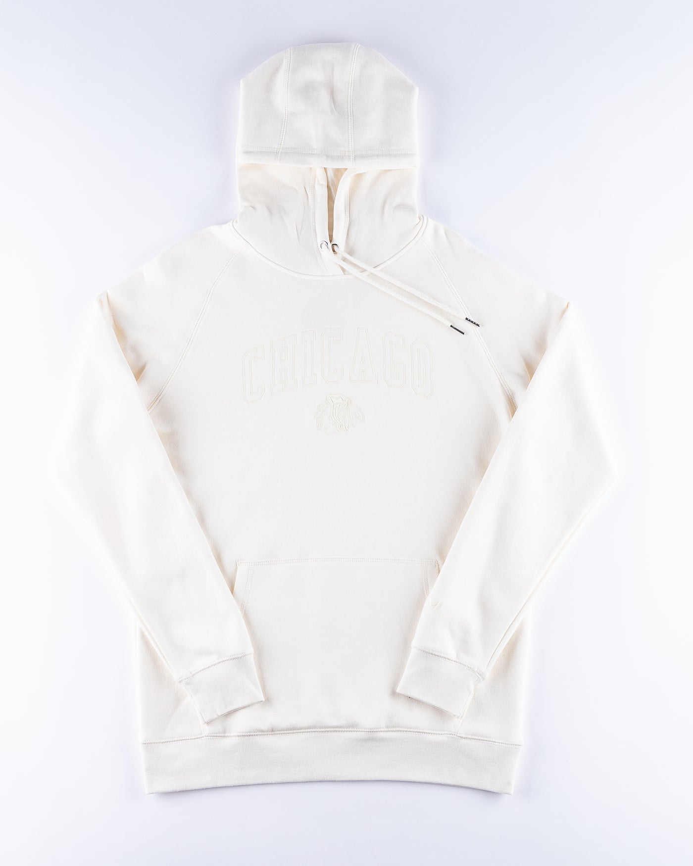 white CCM hoodie with tonal Chicago wordmark across chest with Chicago Blackhawks primary logo embroidered beneath - front lay flat
