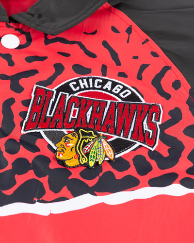 black and red New Era vintage coach inspired jacket with Chicago Blackhawks graphics on left chest and back - embroidered left chest detail lay flat