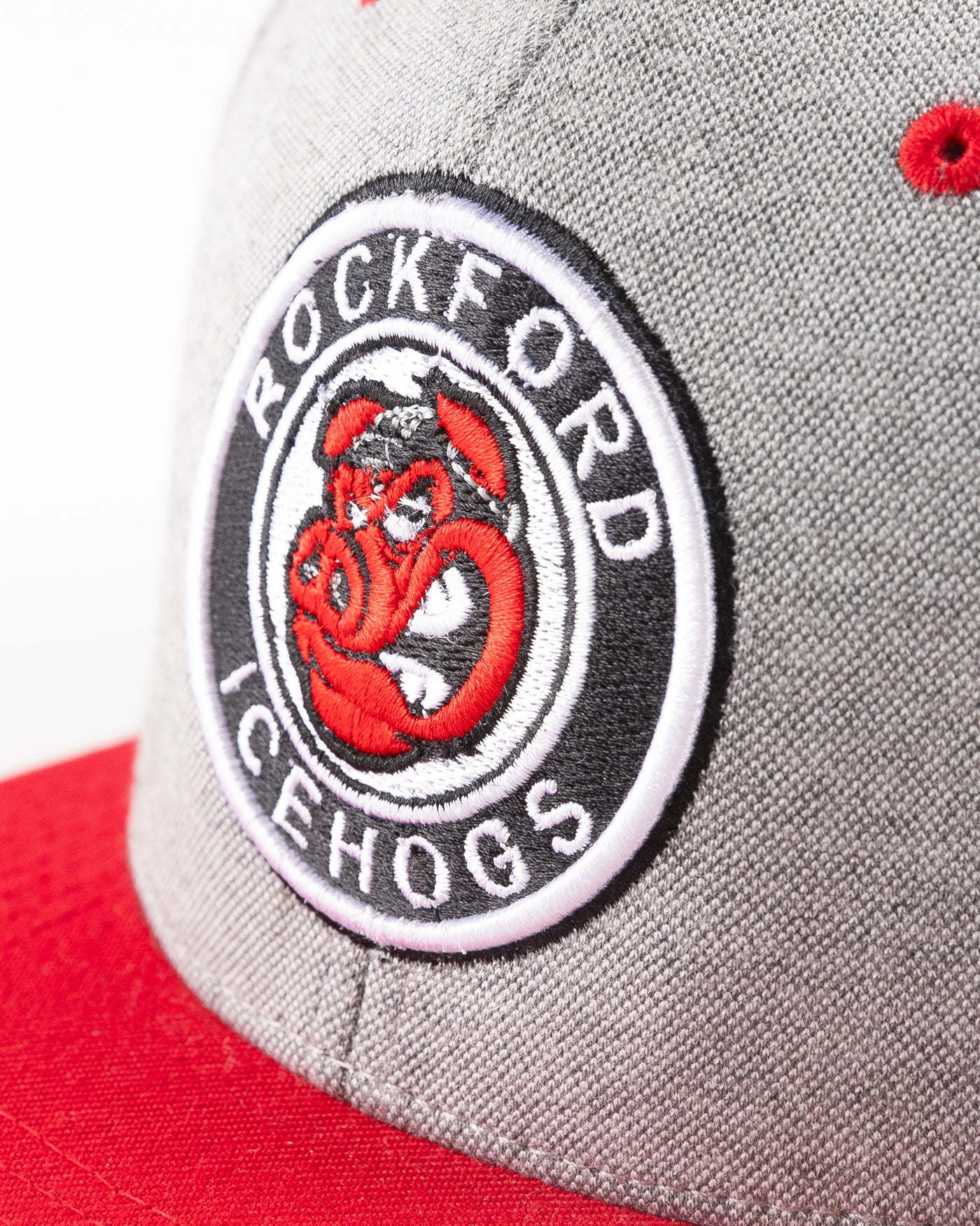 grey Rockford IceHogs snapback with red brim and embroidered IceHogs patch - detail lay flat