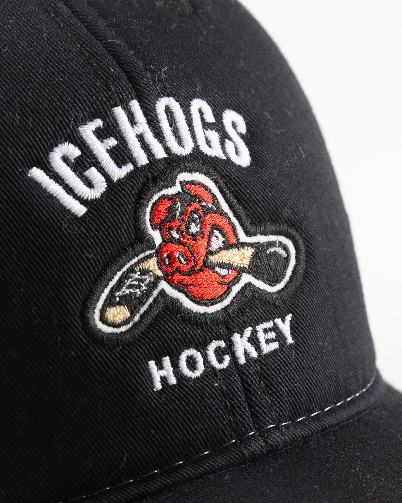 black and white trucker with embroidered IceHogs Hockey graphic on front panel - detail lay flat