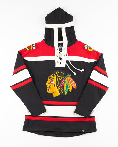 black and red '47 brand skate lace hoodie with Chicago Blackhawks primary logo embroidered on front and secondary logos embroidered on shoulders - front lay flat