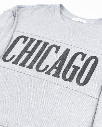 grey '47 brand long sleeve ladies tee with Chicago wordmark across chest and Chicago Blackhawks primary logo on left shoulder - detail lay flat