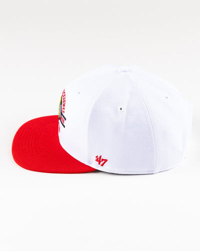 white and red '47 brand flat brim snapback with Chicago Blackhawks graphic embroidered on front - left side lay flat 