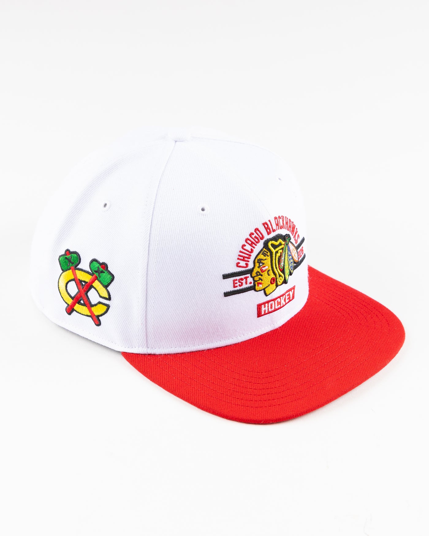 white and red '47 brand flat brim snapback with Chicago Blackhawks graphic embroidered on front - right angle lay flat 