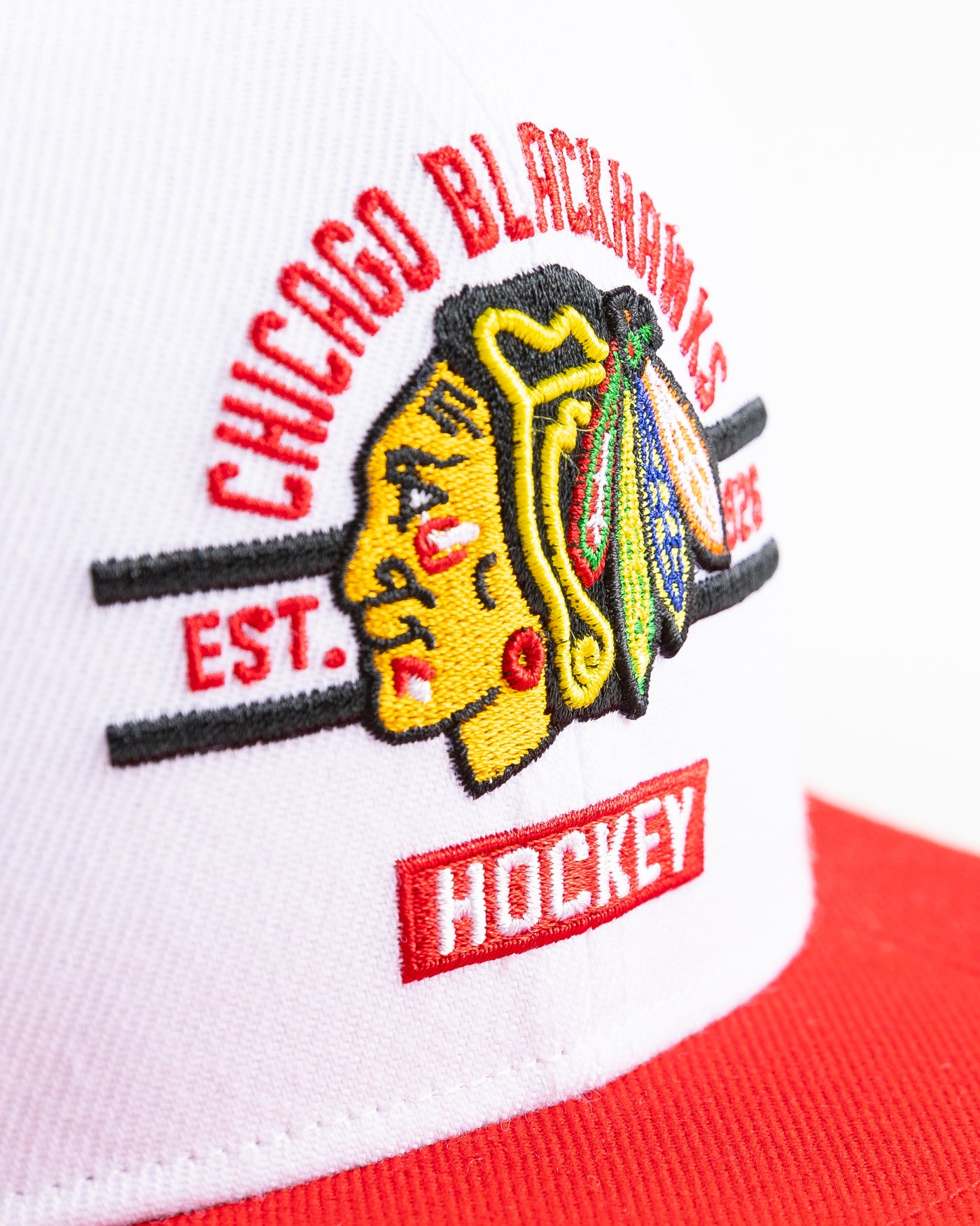 white and red '47 brand flat brim snapback with Chicago Blackhawks graphic embroidered on front - detail lay flat 