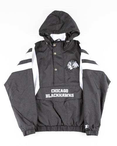 black Starter windbreaker jacket with Chicago Blackhawks wordmark and primary logo - front lay flat