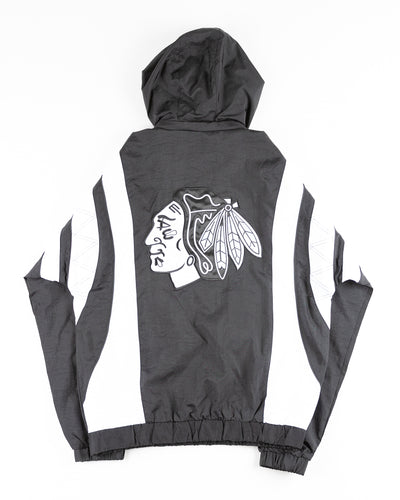 black Starter windbreaker jacket with Chicago Blackhawks wordmark and primary logo - back lay flat