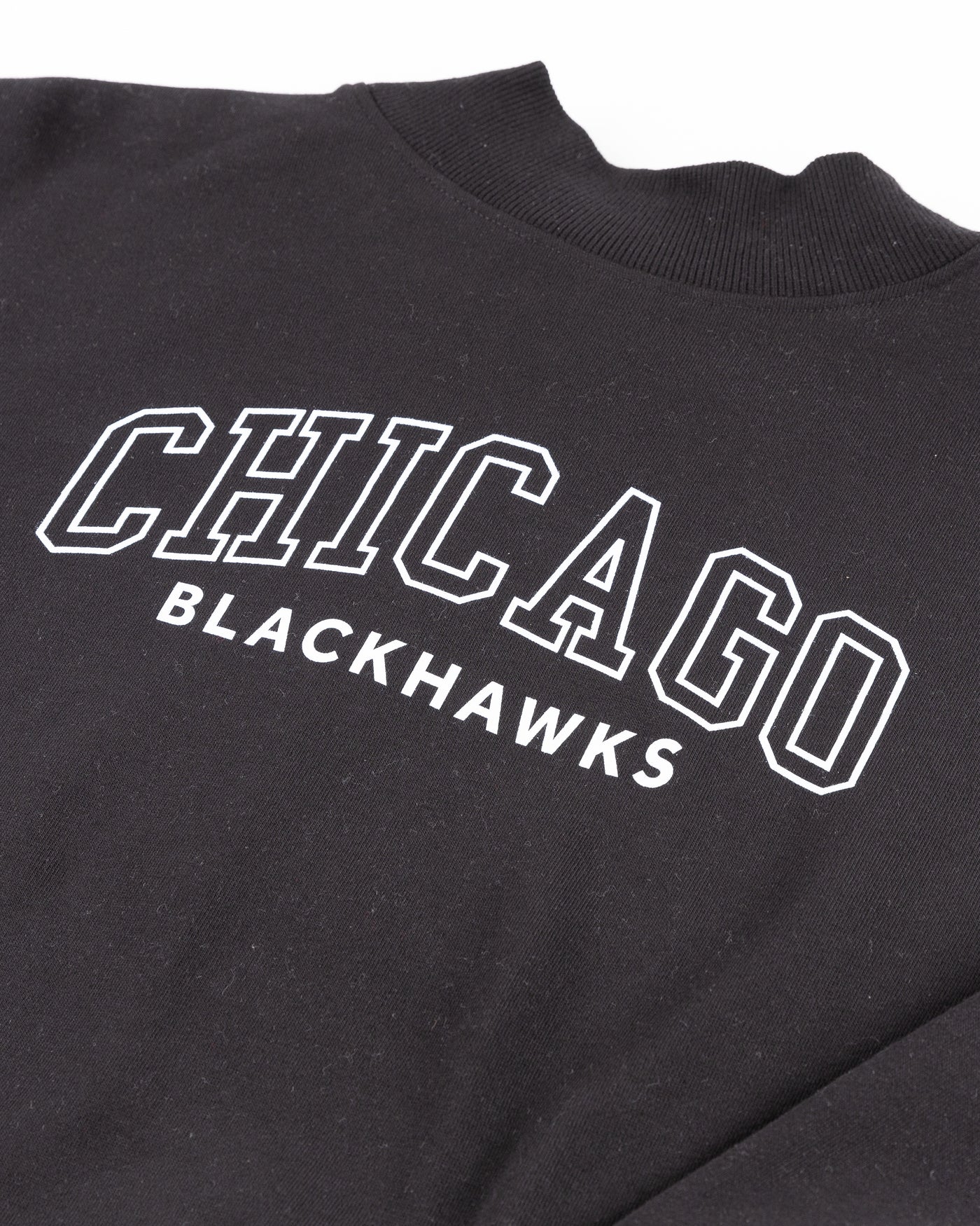 black cropped mock neck sweater with Chicago Blackhawks wordmark - detail lay flat