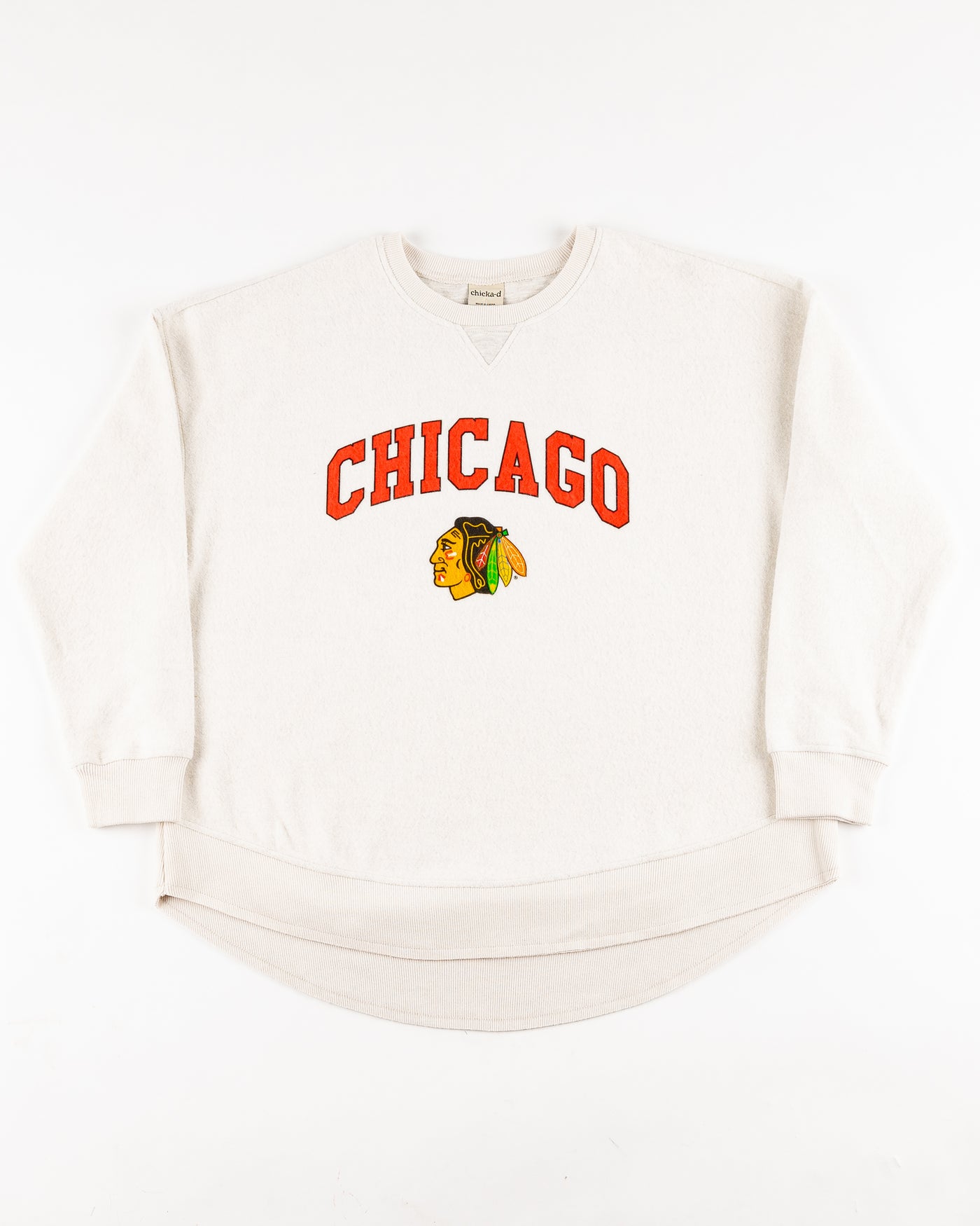 white chicka-d ladies crewneck with Chicago wordmark and Chicago Blackhawks primary logo - front lay flat