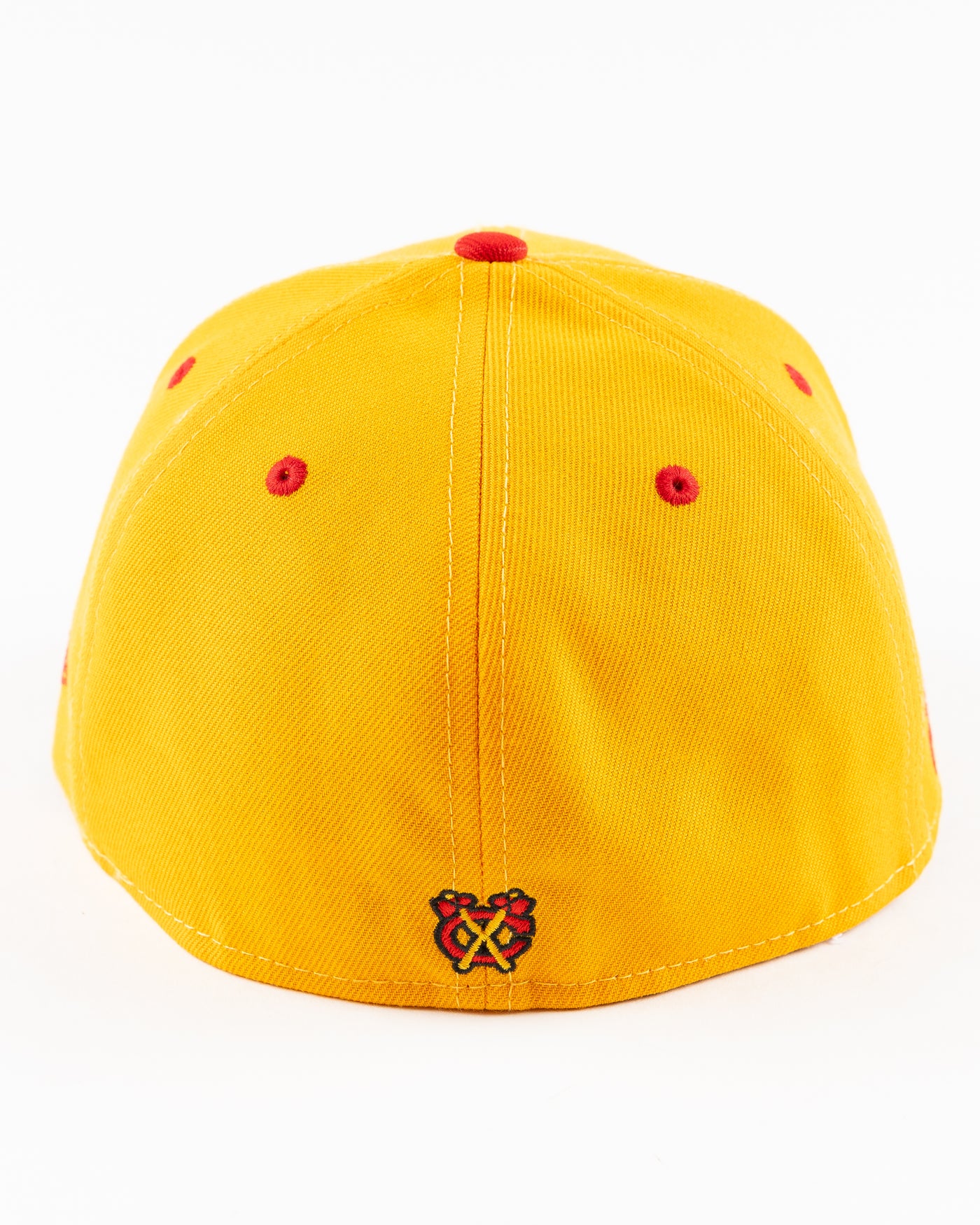 yellow and red New Era fitted cap with Chicago Blackhawks wordmark on front - back lay flat