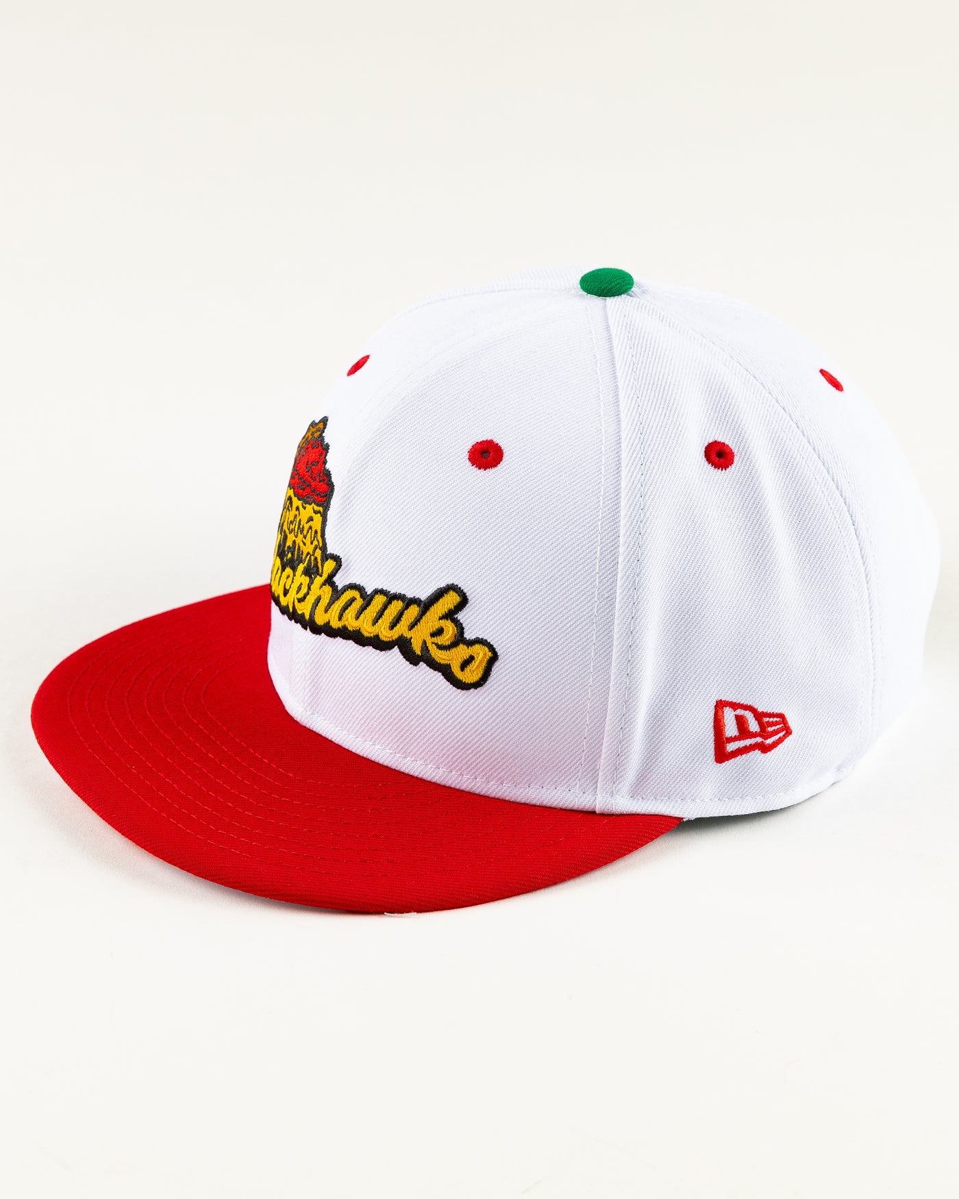 white and red New Era snapback with Chicago Blackhawks wordmark and deep dish pizza design - left angle lay flat