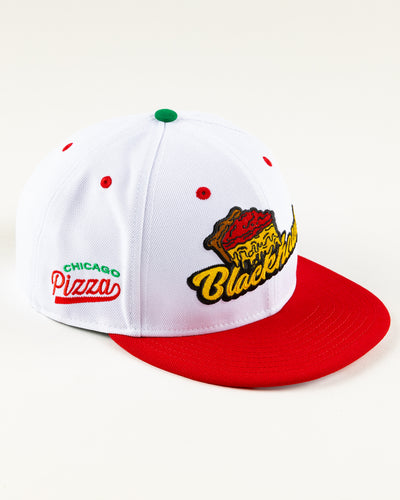white and red New Era snapback with Chicago Blackhawks wordmark and deep dish pizza design - right angle  lay flat