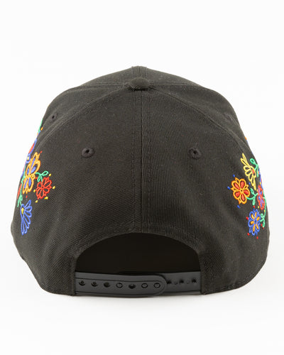 black New Era snapback with Chicago Blackhawks primary logo surrounded by floral pattern - back lay flat