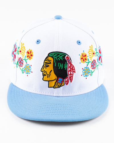 white and blue New Era snapback with vintage Chicago Blackhawks logo and floral pattern on front - front lay flat