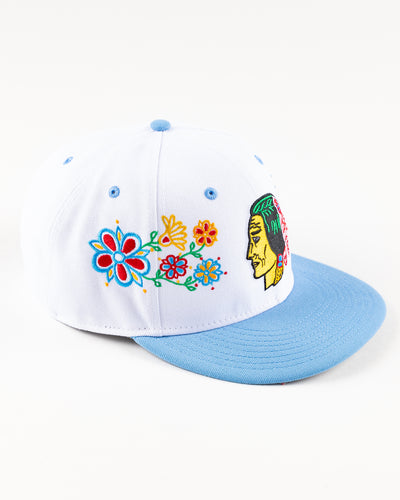 white and blue New Era snapback with vintage Chicago Blackhawks logo and floral pattern on front - right angle lay flat