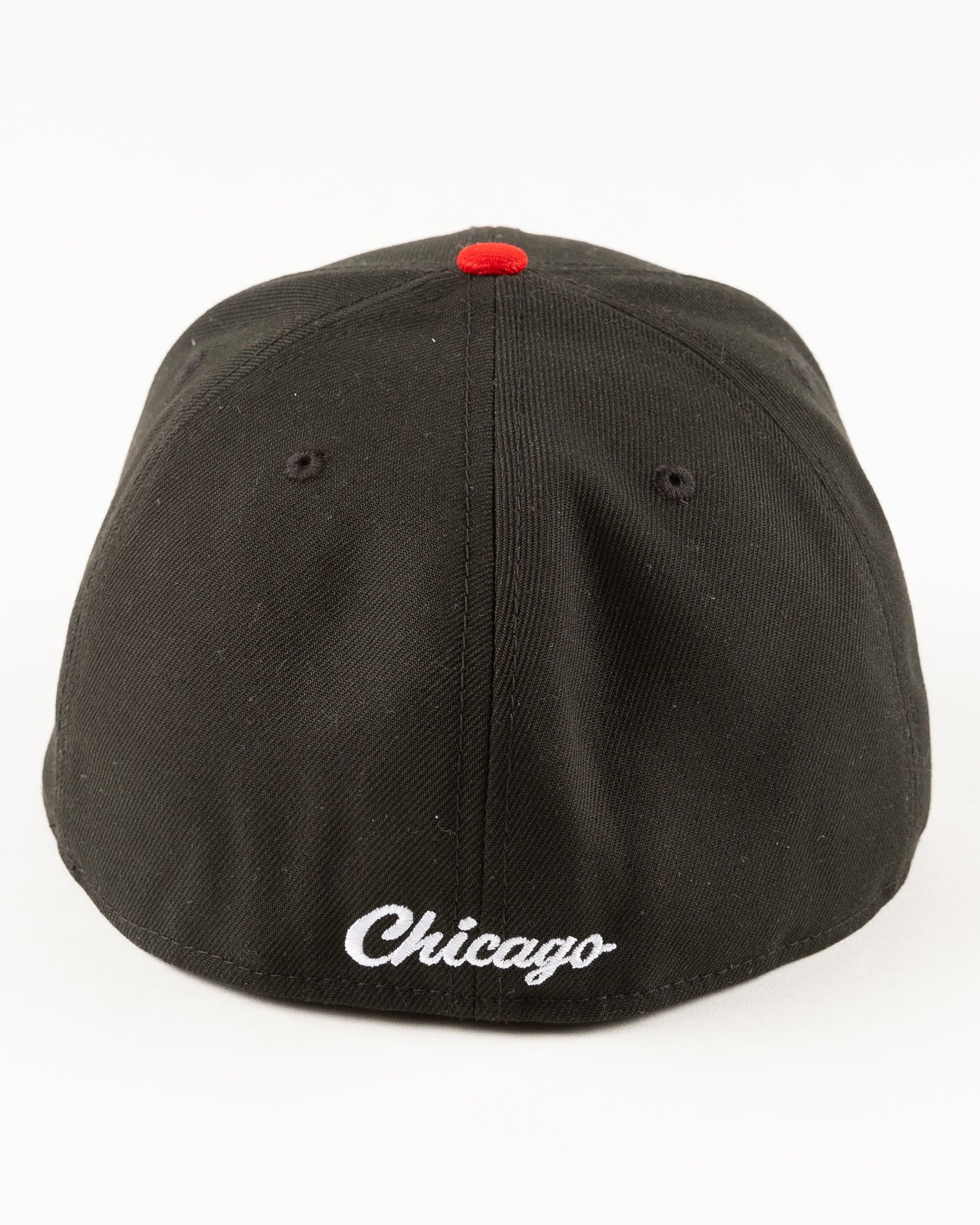 black and blue New Era fitted cap with tonal Chicago Blackhawks primary logo on front - back lay flat