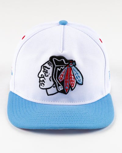white and blue New Era snapback with Chicago Blackhawks primary logo on front - front lay flat