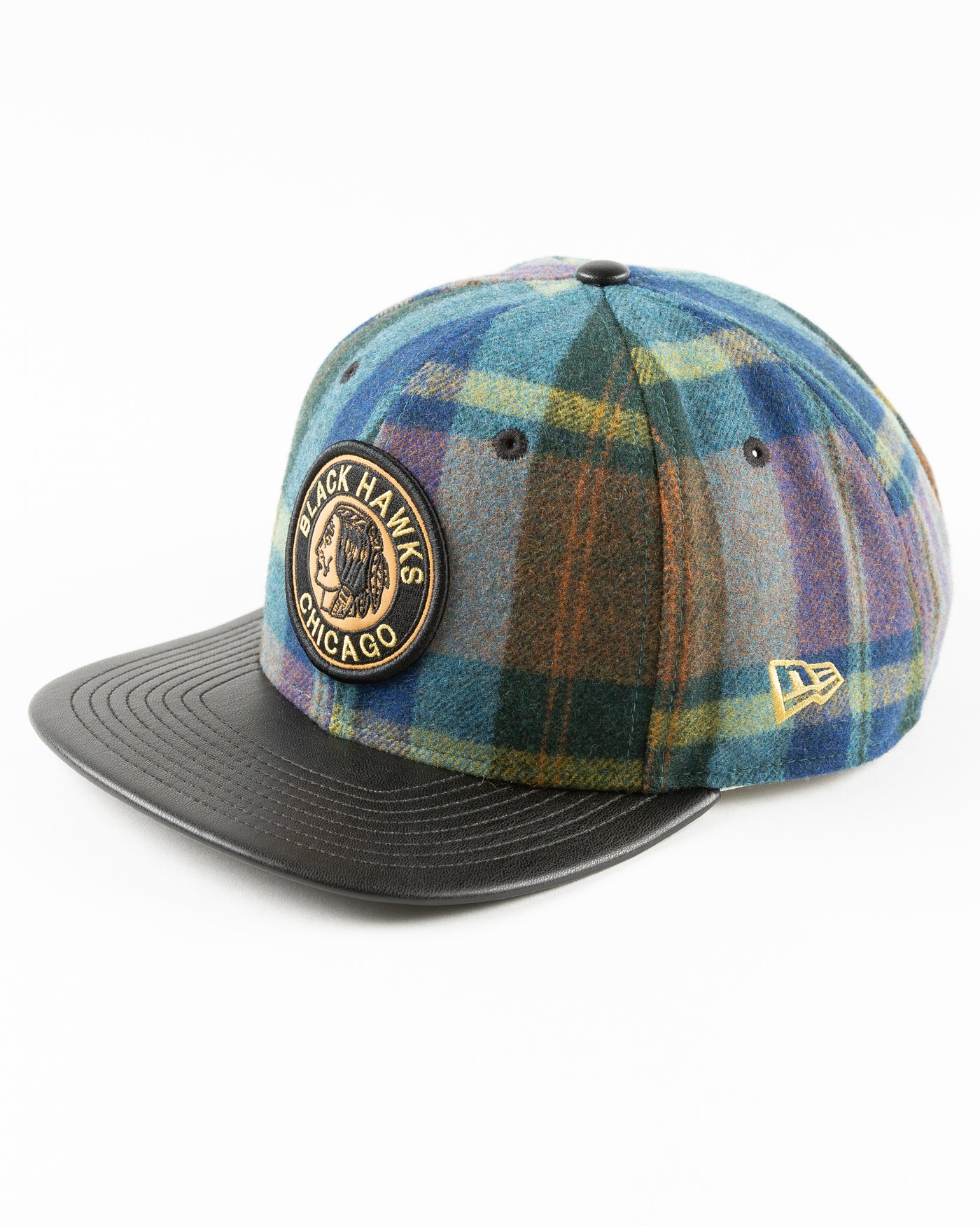 New Era snapback with wool checker crown and vintage Chicago Blackhawks logo and leather flat brim - left angle lay flat