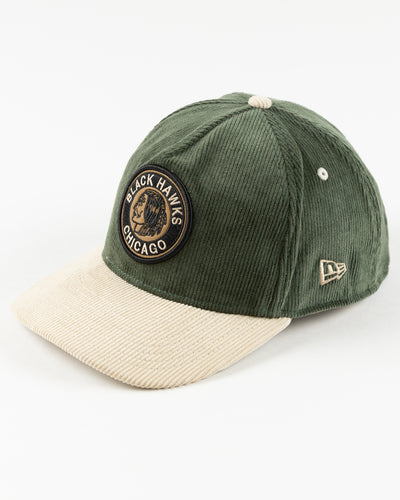 green and cream corduroy adjustable New Era cap with Chicago Blackhawks vintage logo on front - left angle lay flat
