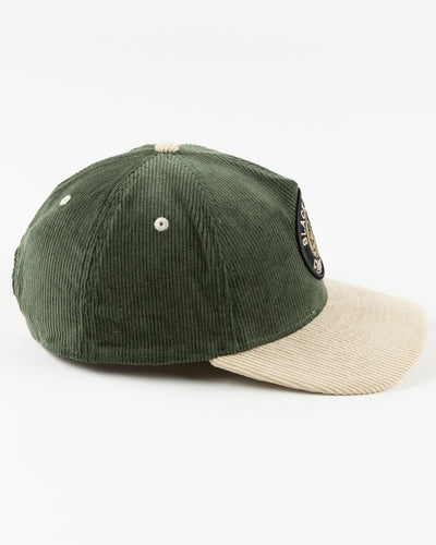 green and cream corduroy adjustable New Era cap with Chicago Blackhawks vintage logo on front - right side lay flat