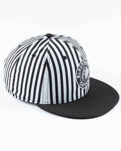 black and white zebra printed New Era snapback cap with tonal Chicago Blackhawks logo on front - right angle lay flat