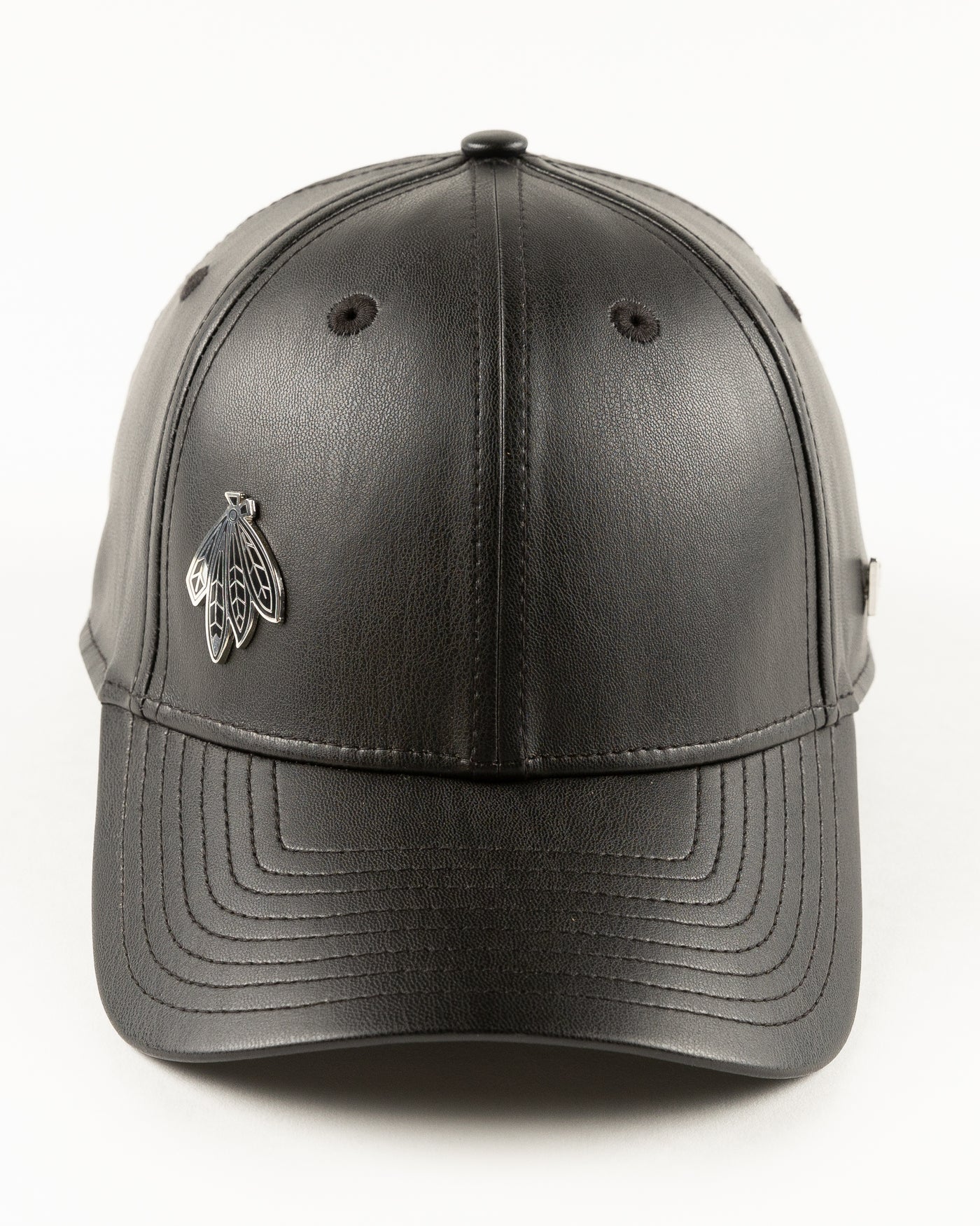 black leather New Era cap with Chicago Blackhawks four feathers logo in silver pin on front - front lay flat