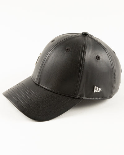 black leather New Era cap with Chicago Blackhawks four feathers logo in silver pin on front - left angle lay flat