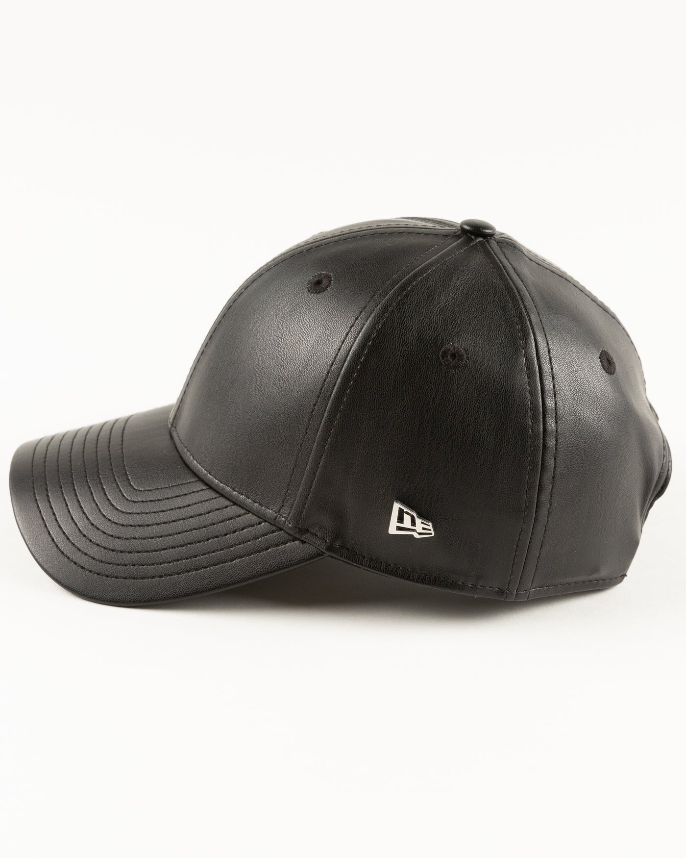black leather New Era cap with Chicago Blackhawks four feathers logo in silver pin on front - left side lay flat