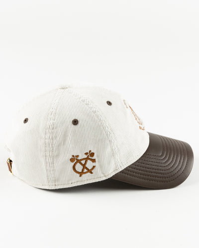 cream and brown New Era adjustable cap with tonal Chicago Blackhawks logo - left side  lay flat