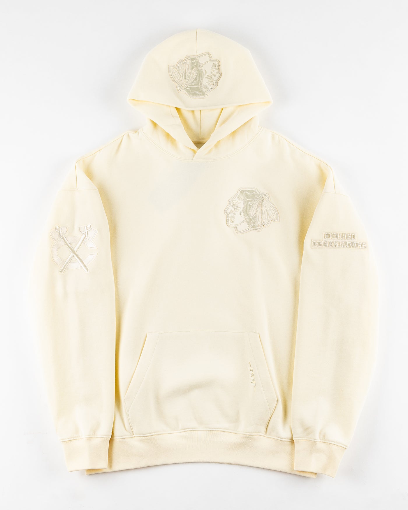 eggshell Pro Standard hoodie with embroidered tonal patches on front, shoulders and hood - front lay flat